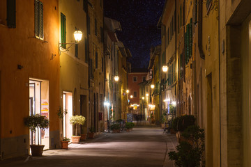 Night view of ancient Tuscany city San Quirico Dorcia, in Italy. Travel european background.