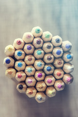 Color pencils on wooden desk