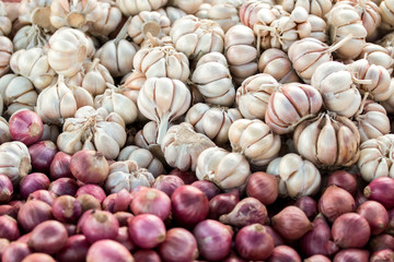 Onions and garlic background.