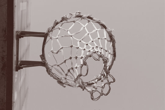 The basketball hoop with brown colored tone from the worm eye-view, selective focus
