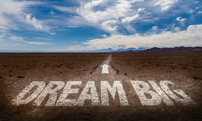 Dream Big written on desert road