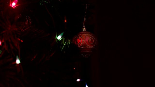 4k Close up Christmas tree lights and Garland toys