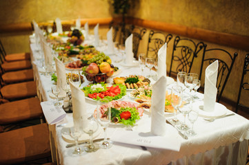 Banquet wedding table setting on evening reception