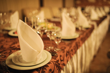 Banquet wedding table setting on evening reception