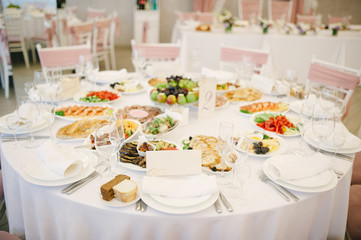 Banquet wedding table setting on evening reception