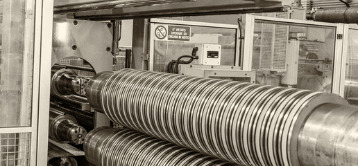 Factory with machine to cut steel