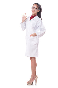 Full Length Of Young Scientist Showing OK Sign.