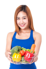 Healthy eating, happy young woman with vegetables on white background