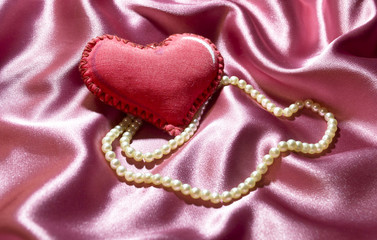 Valentine textiles and handmade necklace made of pearls
