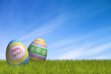 Decorated Easter eggs in the grass under a blue sky