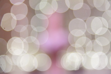 Celebratory background./Beautiful Rasfokus lights of Christmas garlands.