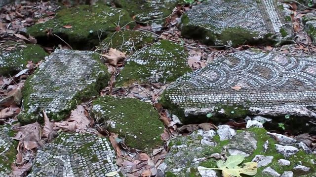 High angle view of mosaic sidewalk and broken columns in Olympos Turkey Likya