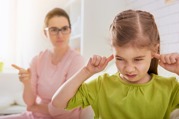 mother scolds her child