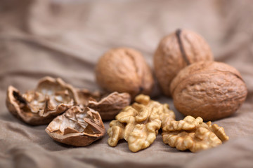 Walnut without shell close-up, and nuts in the shell