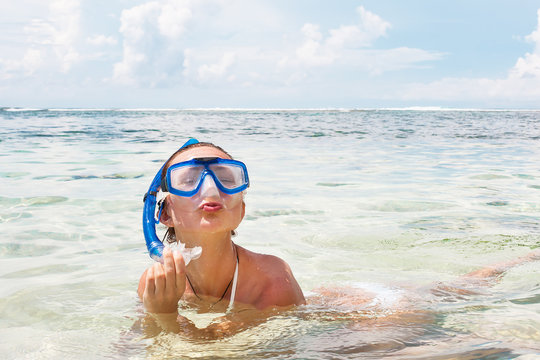 Woman snorkeling - Stock image.