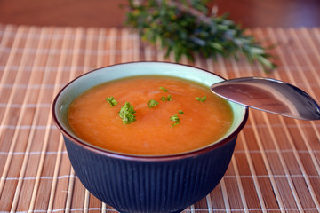 Pumpkin Creme Soup In The Bowl With Parsley   