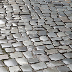 pattern of wet cobble stones