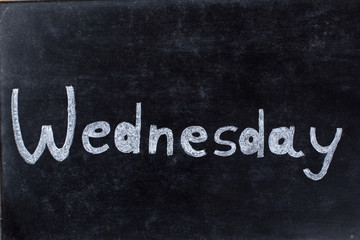 Wednesday handwritten on blackboard