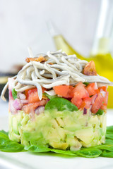 Vegetables and baby eel or elvers tartar
