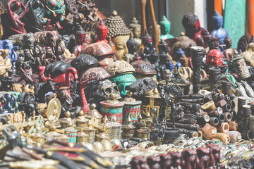 Obraz premium Masks, dolls and souvenirs in street shop at Durbar Square in Ka