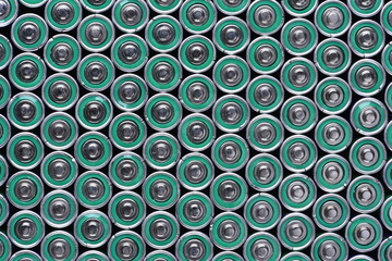 Group of alkaline batteries as background