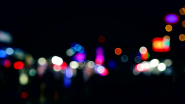 City Blur Background. Moving Bokeh Circles Of Night Traffic.