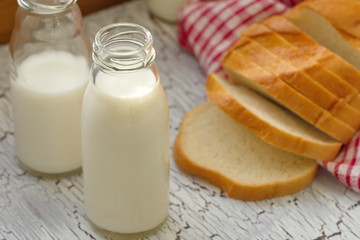 Milk and sliced wheat bread