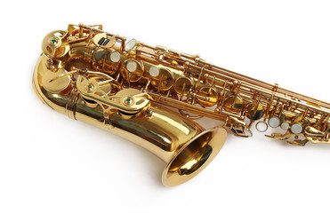 Obraz premium Golden saxophone isolated on white background, close up