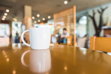 white coffee cup in coffee shop