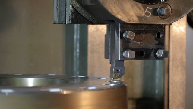 Industrial lathe works metal in Factory