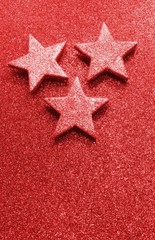 large silver stars on bright red glittery background