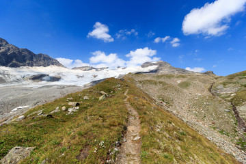 Fototapeta na wymiar Footpath and glacier panorama with mountain Kristallwand in Hohe Tauern Alps, Austria
