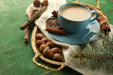 Cup of coffee on metal trey, closeup