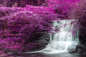 Beautiful alternate colored surreal waterfall landscape © veneratio
