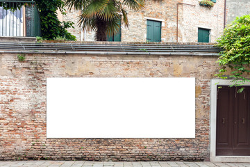 Blank billboard with copy space on the wall in Venice