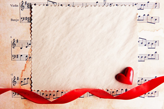 Blank present Valentine card on music sheet background