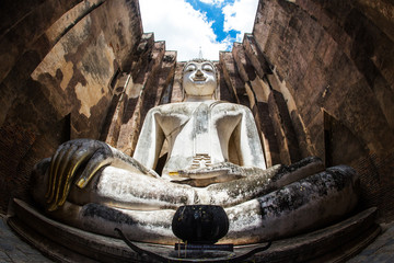 SUKHOTHAI THAILAND: The Main Buddha with golden hand in the temp