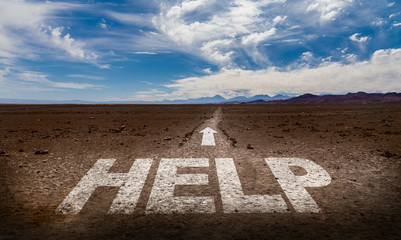 Help written on desert road