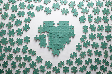 broken heart from green puzzles