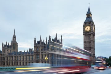 Poster Big Ben and Palace of Westminster in the early morning, red buses passing in London © andersphoto
