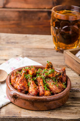 Grilled chicken wings with beer