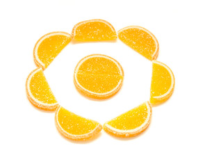 Fruit jelly slices in sugar on a white background