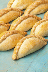 Kibinai  (kybyn,kybynlar,chiburekki,pelmeni,shishlik)  are traditional pastries filled with mutton and onion, popular with Karaite ethnic minority in Lithuania. 