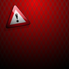 danger sign with an exclamation point on a red background in front grille