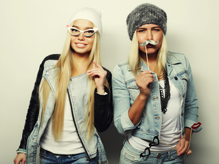 two stylish sexy hipster girls best friends ready for party