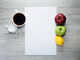Blank paper, apple and coffee