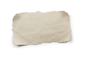 Piece of torn paper isolated on white paper