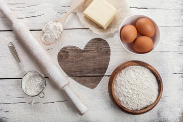 The heart of flour on the table.