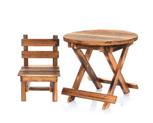 Wooden table and chair isolated on white background