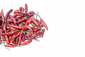 Fototapeta premium chillies dried in the sun on white background